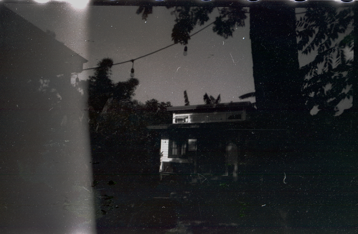 black and white photo of a small shack