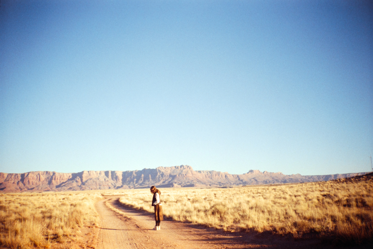 a female figure in the desert of arizona