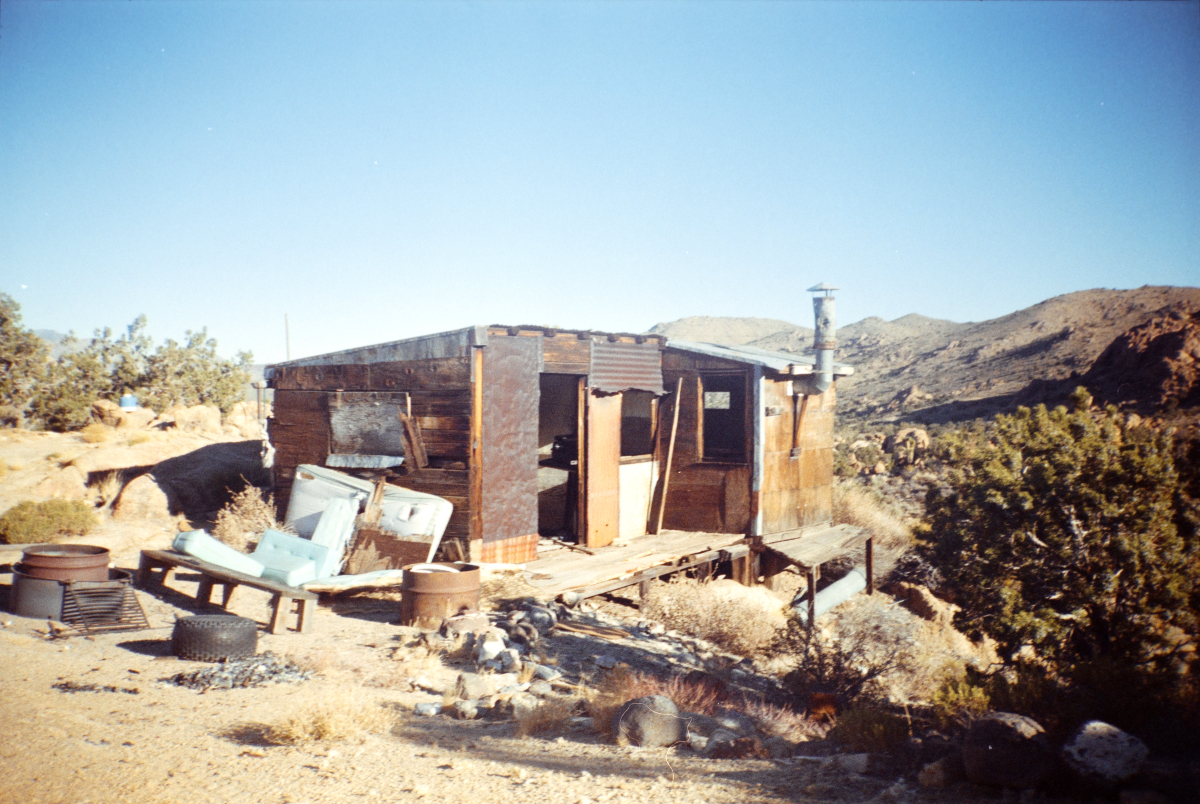 abandoned miners cabin in the desert