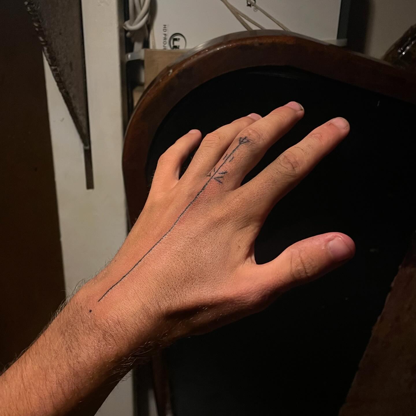 tattoo of lines on hand