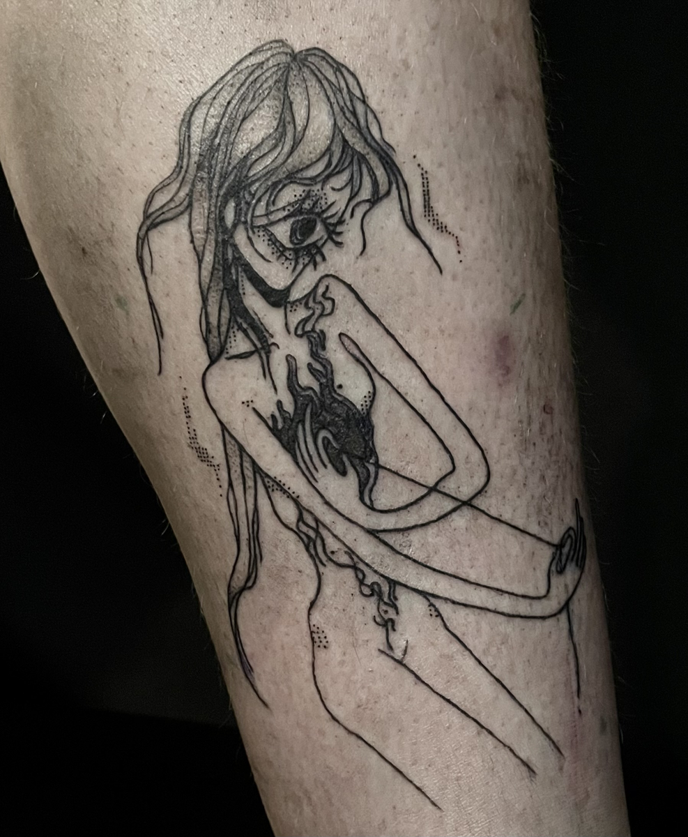 tattoo of a lady with one eye