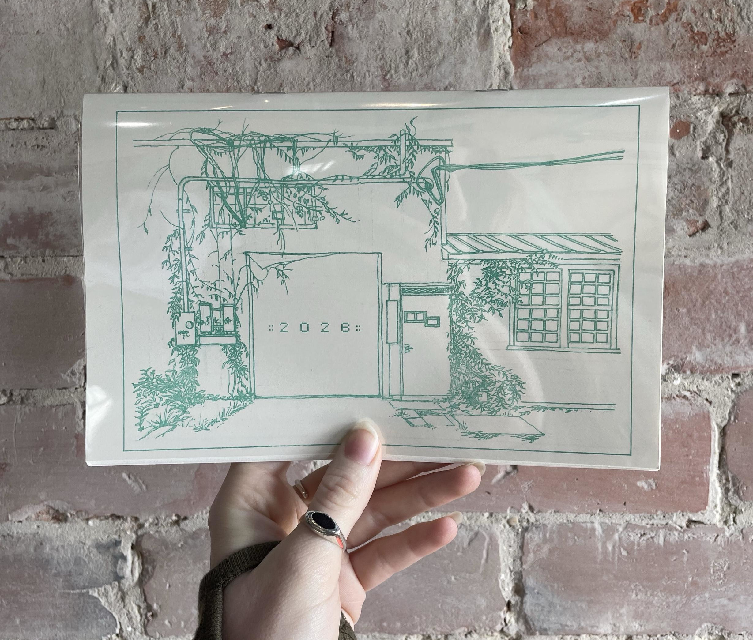 2026 calendar zine in hand